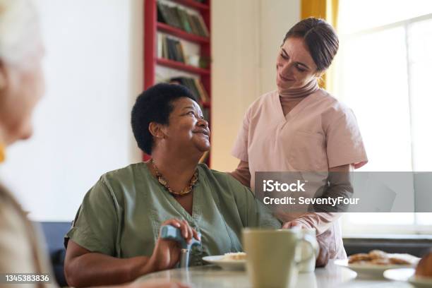 Smiling Senior Woman in Nursing Home