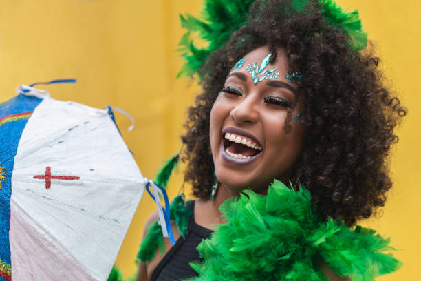 Smiling woman celebrating the Carnival in Pernambuco, Brazil Pernambuco State, Brazil, Olinda, Recife, Brazilian Carnival mardi gras women stock pictures, royalty-free photos & images
