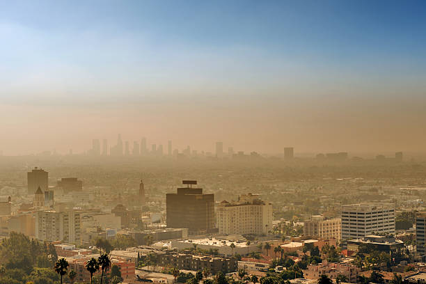 Smog over Los Angeles at sunset Air pollution over Los Angeles at sunset. smog stock pictures, royalty-free photos & images