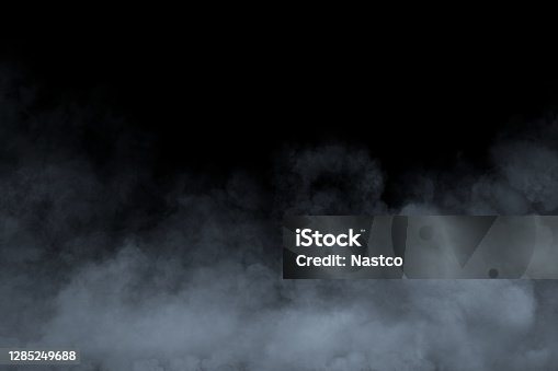istock Smoke or fog isolated on black background 1285249688