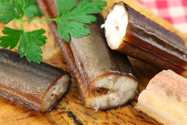 smoked eel or räucheraal - paling stockfoto's en -beelden