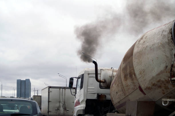 smoky truck on a road smoky truck in a traffic jam, outdoor cropped shot exhaust pipe stock pictures, royalty-free photos & images
