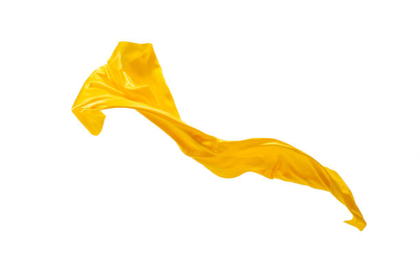 Smooth elegant transparent yellow cloth separated on white background Smooth elegant transparent yellow cloth isolated or separated on white studio background. Texture of flying fabric. levitation stock pictures, royalty-free photos & images