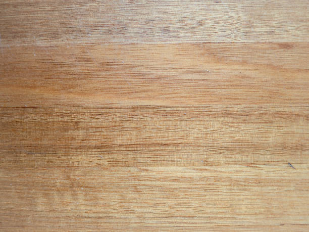 Smooth light wooden surface with visible grain stock photo