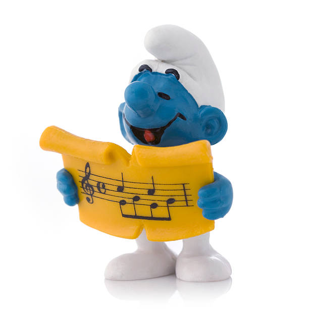 Smurf with song sheet stock photo