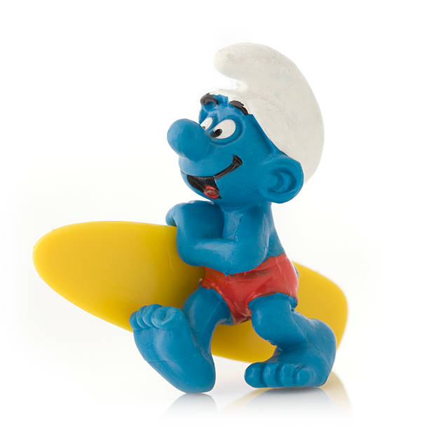 Smurf with surfboard stock photo