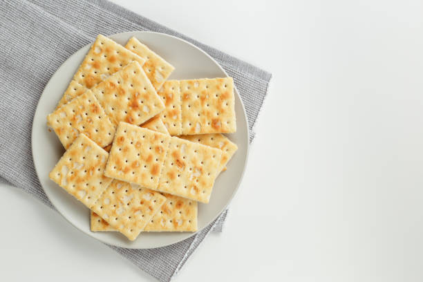 Snack plate of crackers closeup on the table stock photo