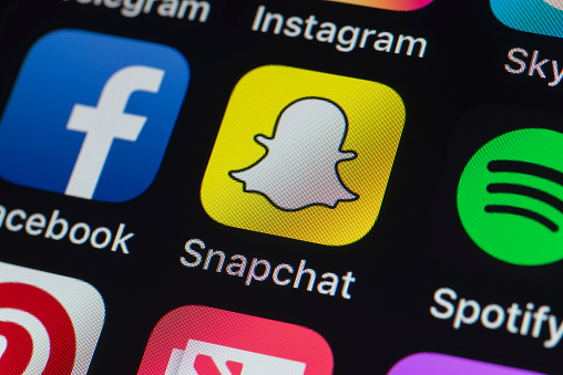 Snapchat, Facebook, Spotify and other phone Apps on iPhone screen