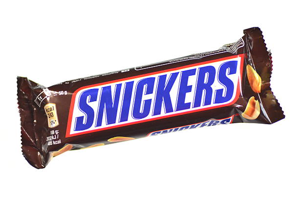 Snickers chocolate bar isolated on white background stock photo