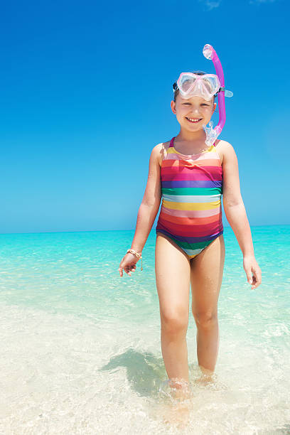 Snorkeling Little girl ready for snorkeling little girls in bathing suits stock pictures, royalty-free photos & images