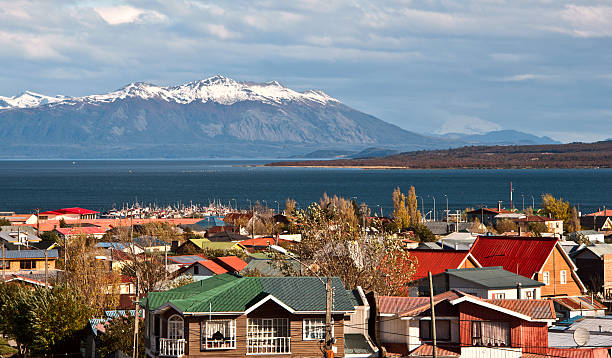 Snow capped mountains behind Puerto Natales,Patagonia, Chile stock photo