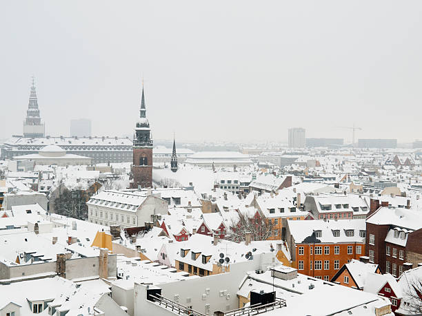 Snow covered rooftops in Copenhagen stock photo