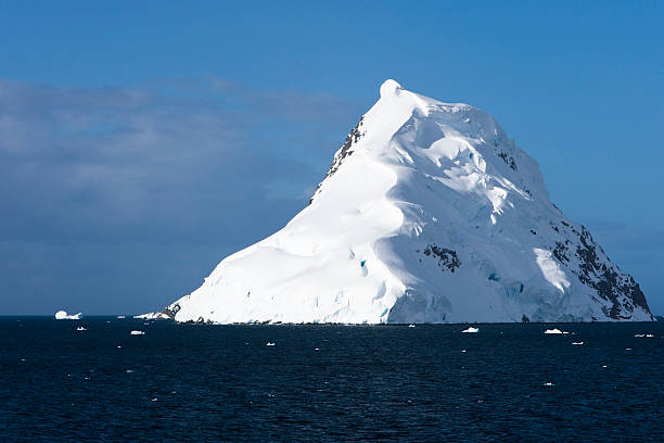 Snow Topped Antarctic Island stock photo