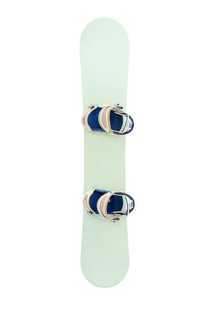 Snowboard with strap-in bindings and stomp pad stock photo