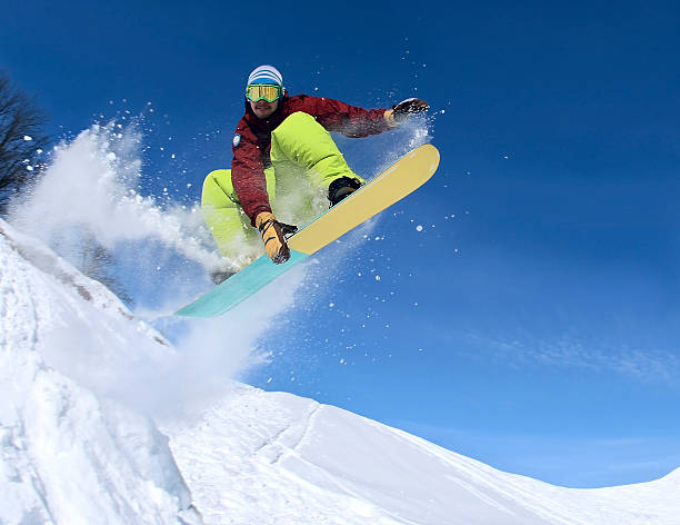 Snowboarder in the sky stock photo