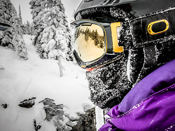 Snowboarder or Skier Side Profile Portrait Outdoors stock photo