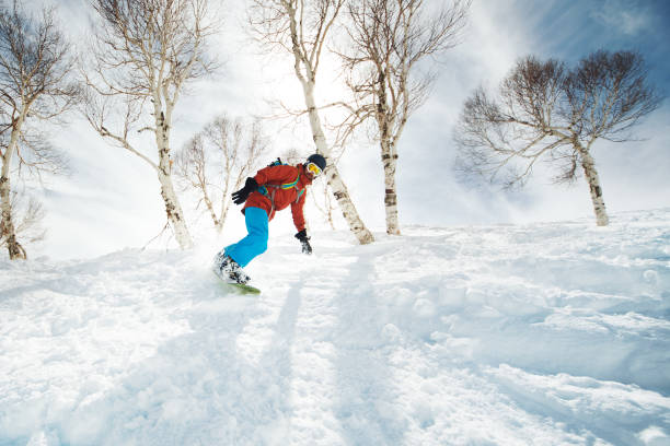 Snowboarding in Kashmir Snowboarding in Kashmir jammu and kashmir stock pictures, royalty-free photos & images