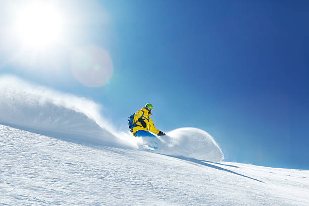Snowboarding Snowboarding powder mountain stock pictures, royalty-free photos & images