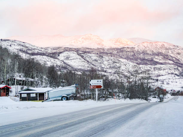 Snow-covered road through center of Hemsedal, Norway winter landscape. stock photo