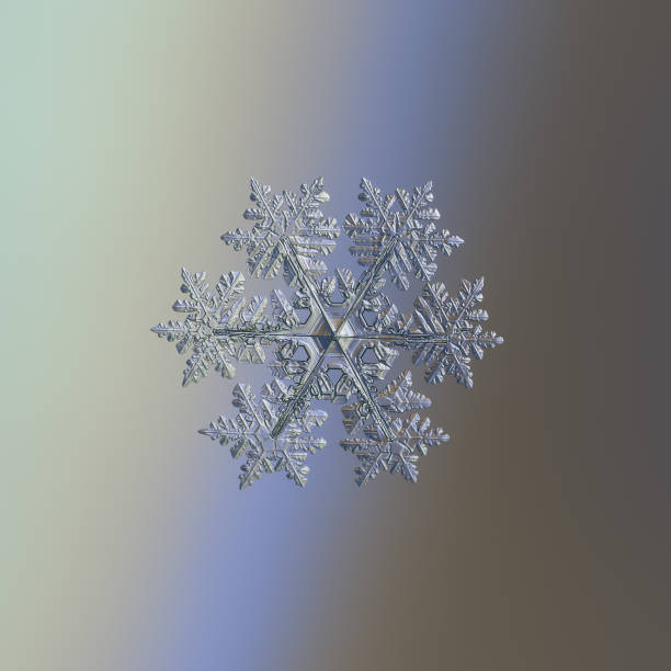 Snowflake on gradient background stock photo