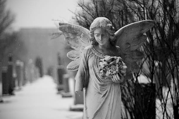 Snowy angel statue stock photo