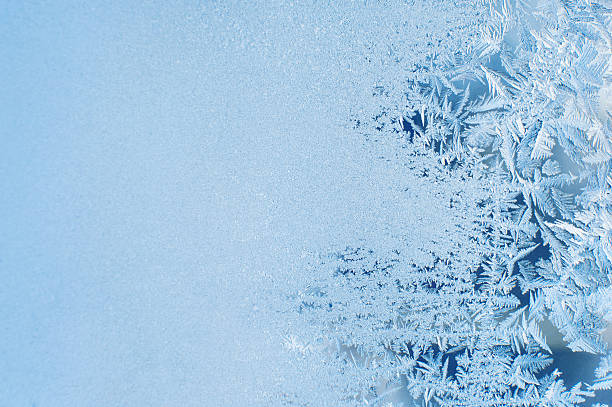 a snowy window frosted overnight  - frost bildbanksfoton och bilder