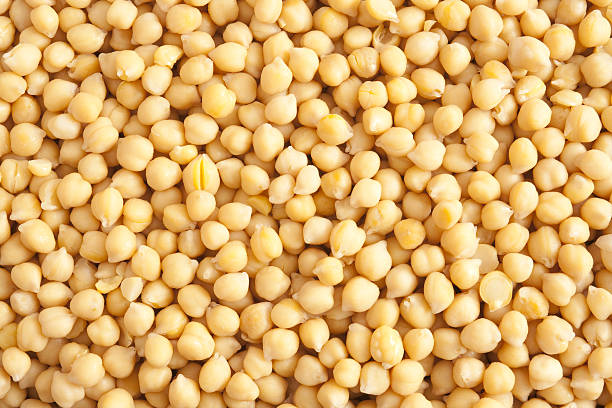 Soaked chickpeas background Top view of soaked chickpeas chick pea stock pictures, royalty-free photos & images