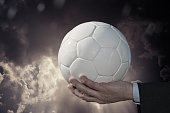 Soccer ball and businessman
