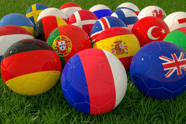 soccer balls with flag on a grass field - portugal flag stadium imagens e fotografias de stock