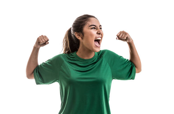 Soccer woman celebrating on green uniform isolated on white background Sport collection Ireland Soccer stock pictures, royalty-free photos & images