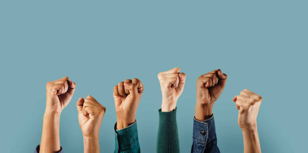 Social Activism and Movement. Group of People Raised Up Hands. Protest, Mob, Expression and Strike Concept stock photo