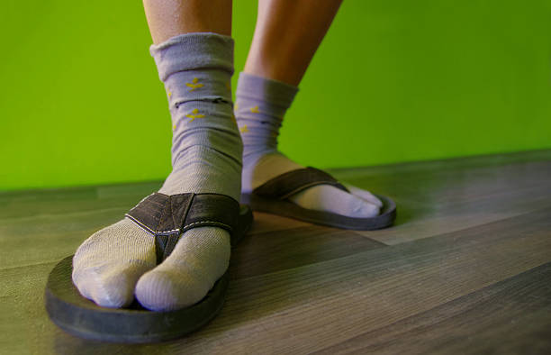 Socks in sandals stock photo