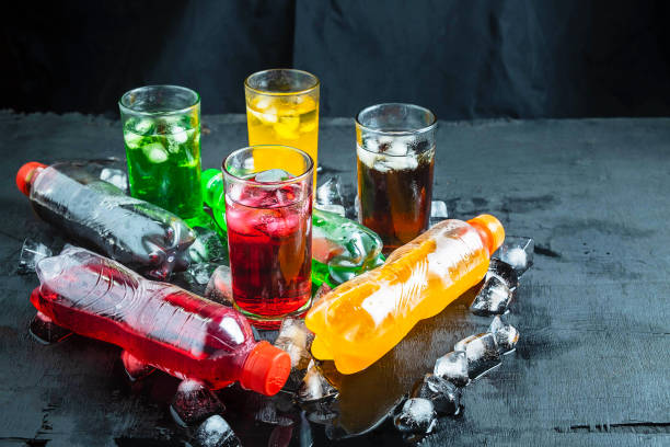 Soft drink And glass of soft drinks on the ice and refreshing stock photo
