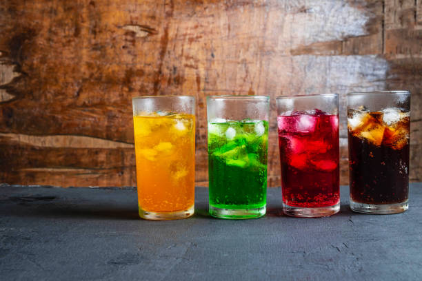 Soft drinks in the glass on the table stock photo