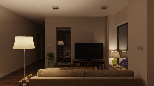 softly illuminated living room with furniture at night - living room night nobody imagens e fotografias de stock
