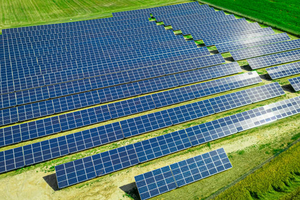 Solar Panels on field. Alternative energy in Poland. Aerial view stock photo