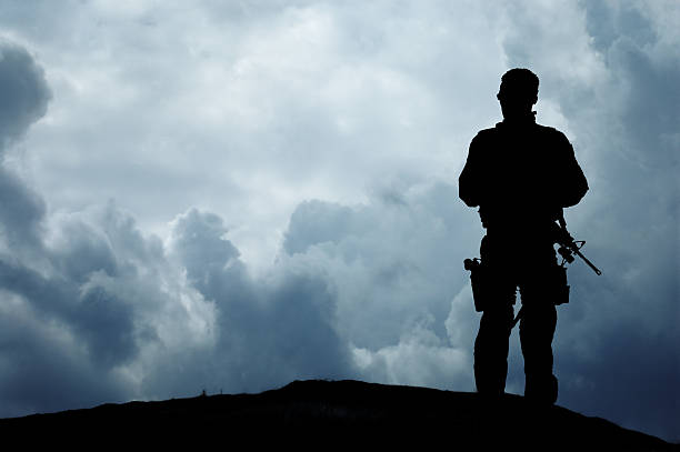 Soldier Overlooks the Horizon stock photo