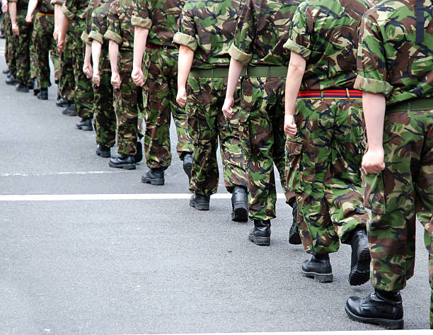 Soldiers marching stock photo