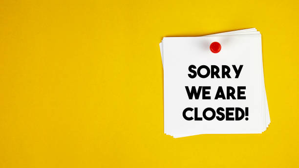 Sorry We Are Closed Sign on the Yellow Background stock photo