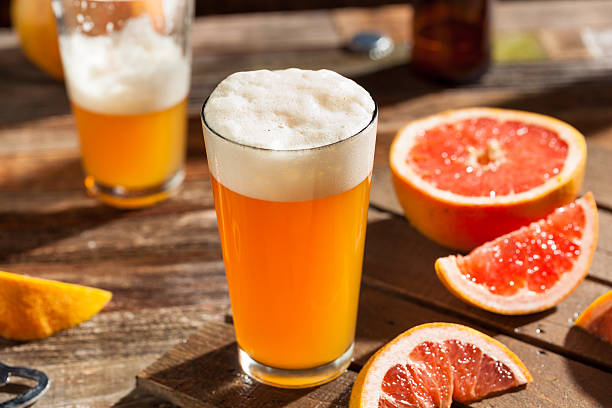 Sour Grapefruit Craft Beer Sour Grapefruit Craft Beer Ready to Drink sour taste stock pictures, royalty-free photos & images