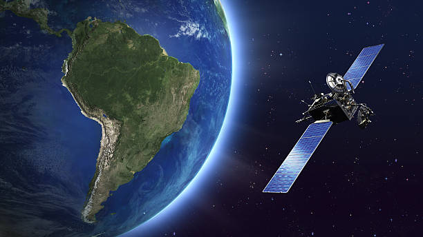 South America. Telecommunication satellite orbiting Earth. Highly detailed telecommunication satellite orbiting the Earth. Satellite and Earth models based on images courtesy of: NASA http://www.nasa.gov.  communications tower photos stock pictures, royalty-free photos & images