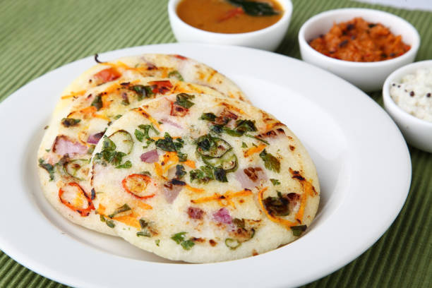 South Indian Food Uttapam or ooththappam or Uthappa South Indian Food Uttapam or ooththappam or Uthappa thosai stock pictures, royalty-free photos & images