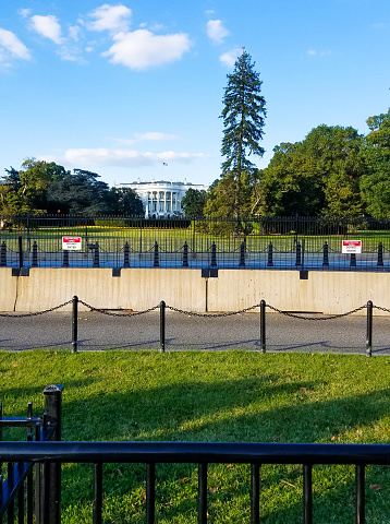 South lawn view of the White House, with security barriers protecting the residence of the president of the United States of America, in Washington, DC.