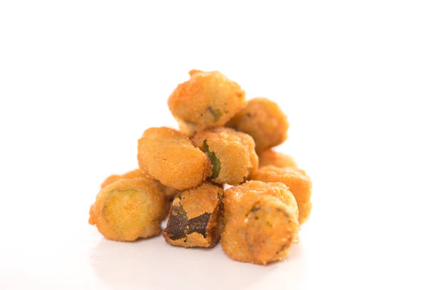 Southern Fried Okra Isolated on a White Background Southern Fried Okra Isolated on a White Background okra photos stock pictures, royalty-free photos & images