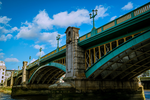 Taken along The River Thames, a view of the Southwark Bridge in London.