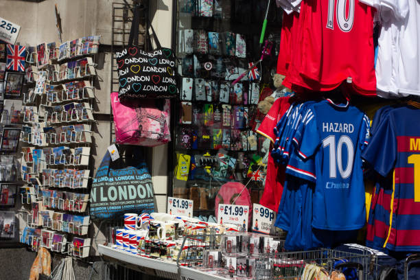 Souvenirs in Gift Shop in Camden Town, London Souvenirs in Gift Shop in Camden Town, London, including a football shirt with the name Eden Hazard on it, a Chelsea star soccer store stock pictures, royalty-free photos & images