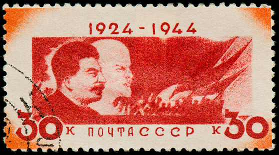 WWII Soviet postage stamp from 1944 with Lenin and Stalin