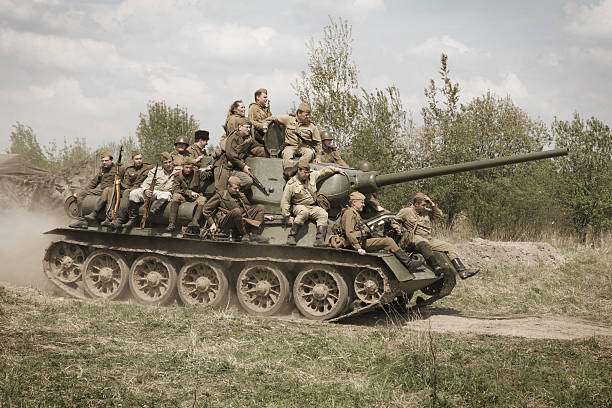 soviet tank t-34 with group of red army soldiers - russian army stok fotoğraflar ve resimler