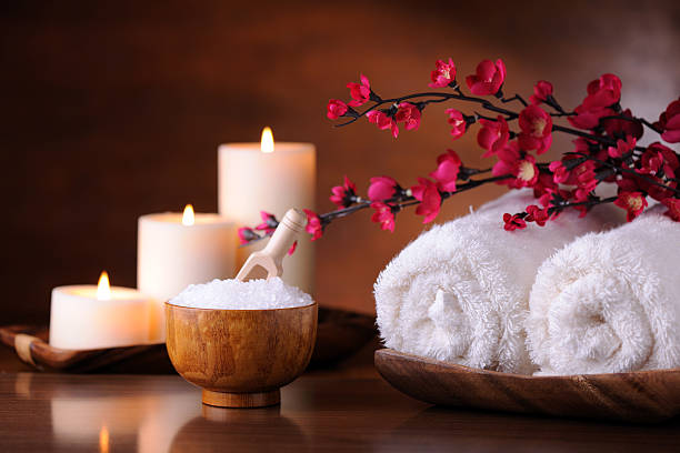 Spa Treatment Tranquil scene with bath and massage items. XXXL image spa stock pictures, royalty-free photos & images