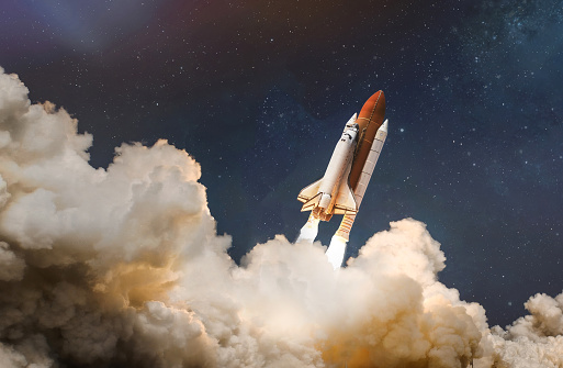 Space shuttle in sky with stars and clouds. Launch from Earth. Expedition to space. Astronauts and spaceship. Elements of this image furnished by NASA (url:https://images-assets.nasa.gov/image/sts129-s-069/sts129-s-069~large.jpg)